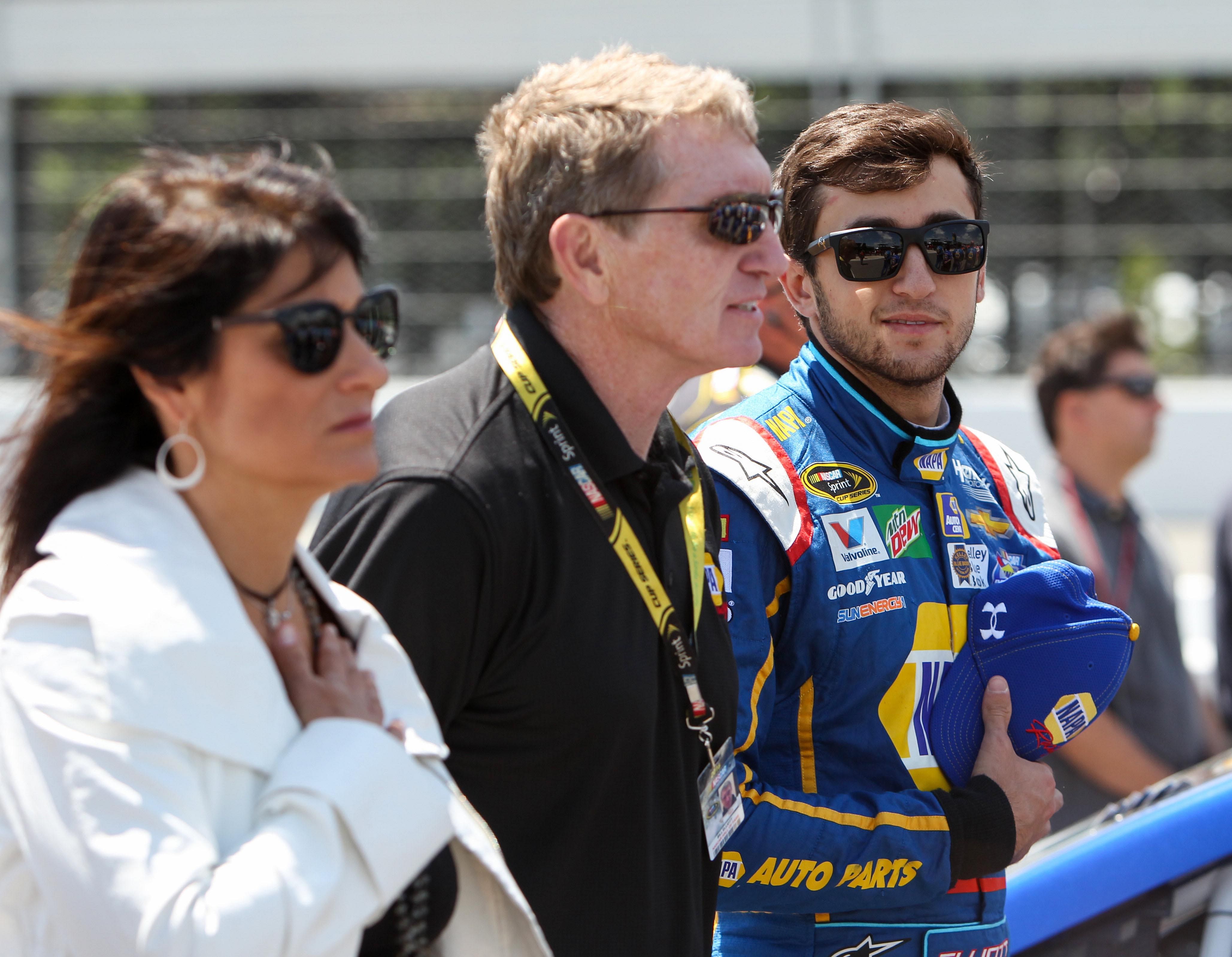 Chase Elliott (R) with his father, Bill Elliott, and mother, Cindy Elliott, at Pocono Raceway. Source: Imagn